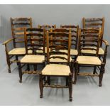 A harlequin set of eight 19th century elm and ash ladder back dining chairs.