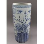 A blue and white porcelain stick stand. 61 cm high.