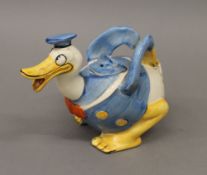 A Wade Heath Donald Duck teapot. 15.5 cm high.