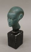 An Egyptian style plaster bust. 20 cm high.