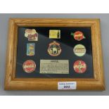 A boxed and framed Coca Cola badge set, Nostalgia 2 limited edition No 1876/2500. 21.5 cm wide.