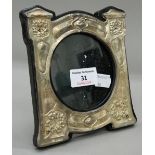 An Art Nouveau silver photograph frame. 14 cm x 15.5 cm.