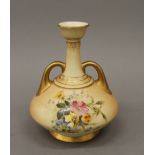 A Royal Worcester blush ivory florally decorated vase. 16 cm high.