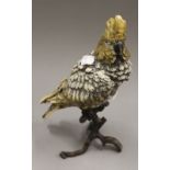 A cold painted bronze model of a parrot.