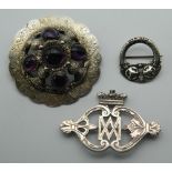 Three various Antique Scottish silver brooches. The largest 6.5 cm diameter.