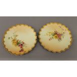 A pair of Royal Worcester blush ivory cabinet plates. 21 cm diameter.