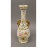 A large Royal Worcester reticulated vase. 45 cm high.