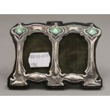 A sterling silver Art Nouveau style double photograph frame. 11 cm wide.