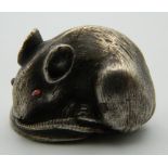 A small model of a rat, bearing Russian marks. 3 cm wide.