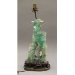 A Chinese green quartz lamp. 55 cm high overall.