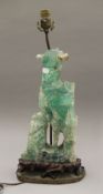 A Chinese green quartz lamp. 55 cm high overall.