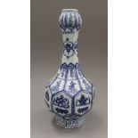 A Chinese blue and white gourd shaped vase. 38 cm high.