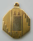 An Art Deco 9 ct gold double picture locket. 2.5 cm wide. 8 grammes total weight.