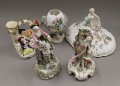 A small quantity of florally encrusted porcelain, including a K.P.M vase. The largest 23 cm high.