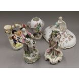A small quantity of florally encrusted porcelain, including a K.P.M vase. The largest 23 cm high.
