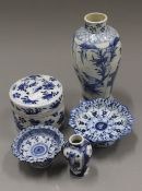 Two Chinese vases, a lidded pot and two dishes. The largest 18 cm high.