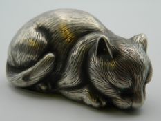A silver model of a cat, bearing Russian marks. 7 cm long. 55.5 grammes.