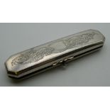 A 19th century Continental silver spectacle case and a pair of spectacles. 13 cm long.