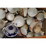 A collection of 18th/19th century porcelain cups, including Worcester, Derby, etc.