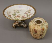 A Royal Worcester florally decorated tazza and a Royal Worcester blush ivory vase. The former 24.