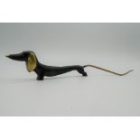 An Austrian bronze model of a dachshund. 21.5 cm long, 3.5 cm high, 1.2 cm deep.