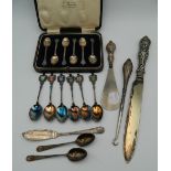 A cased set of silver spoons, etc.