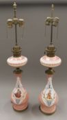 A pair of opalescent glass lamps. 90 cm high overall.