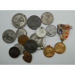 A collection of Royal medallions, including Victoria,