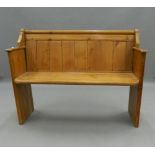 A Victorian pine church pew. 118 cm wide. The property of Germaine Greer.