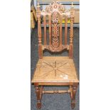 A Victorian carved oak side chair. 45 cm wide.