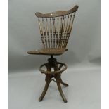 An early 20th century oak swivelling bar chair. 111.5 cm high.