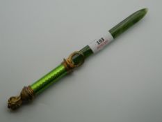 An enamel and silver mounted spinach jade paper knife, bearing Russian marks. 25.5 cm long.