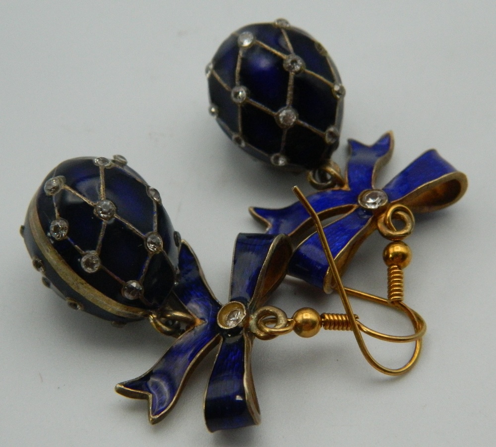 A pair of silver and enamel egg form earrings. 3 cm high. - Image 2 of 2