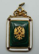 A silver and malachite pendant, bearing Russian marks. 6.5 cm high.