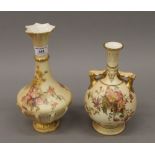 Two Royal Worcester blush ivory florally decorated vases. The largest 26 cm high.