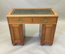 A Victorian mahogany campaign style pedestal desk. 97 cm wide.