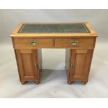 A Victorian mahogany campaign style pedestal desk. 97 cm wide.