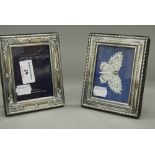 Two small silver photograph frames. Each approximately 10.5 cm x 13 cm.