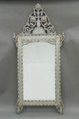 A Syrian mother-of-pearl mounted mirror. 194 cm high. The property of Germaine Greer.