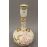 A large Pointons porcelain florally decorated vase. 40 cm high.
