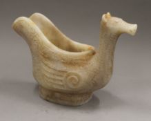 A Chinese archaistic jade duck form vase. 17.5 cm high.