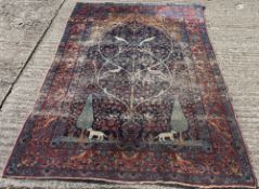 A 19th century Persian tree of life rug. 129 cm wide.