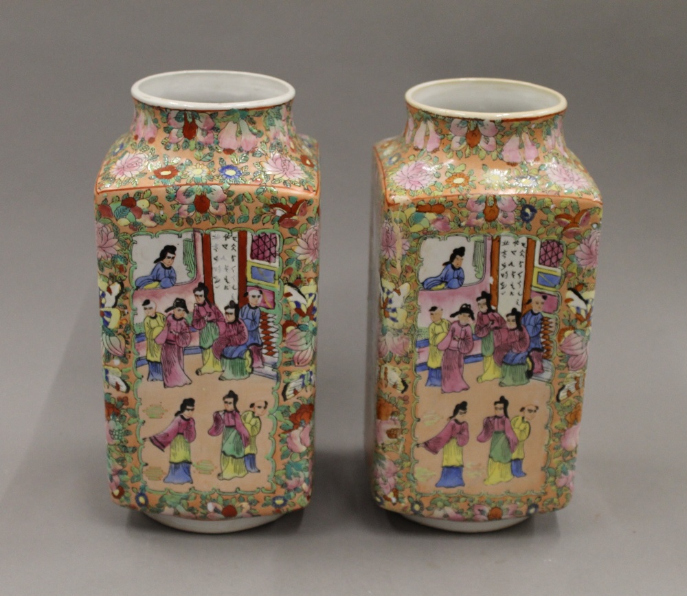 A pair of Chinese square shaped famille rose vases,