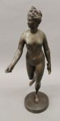 A patinated bronze model of a classical nude female. 60 cm high.