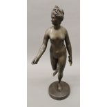 A patinated bronze model of a classical nude female. 60 cm high.