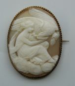 A Victorian 9 ct gold framed cameo brooch. 4.75 cm high.