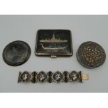 Three Eastern silver boxes and a bracelet. 238.4 grammes total weight.