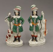 A pair of Victorian Staffordshire figures. 25 cm high.