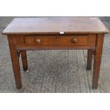 A Victorian pitch pine gothic side table. 115 cm wide.