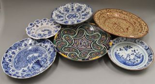 A quantity of various Delft and other chargers, etc. The largest 38 cm diameter.